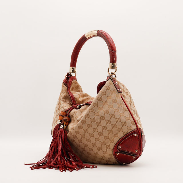 Sac Gucci Indy Hobo toile monogrammée vue de dos occasion authentique — AMANA Vintage