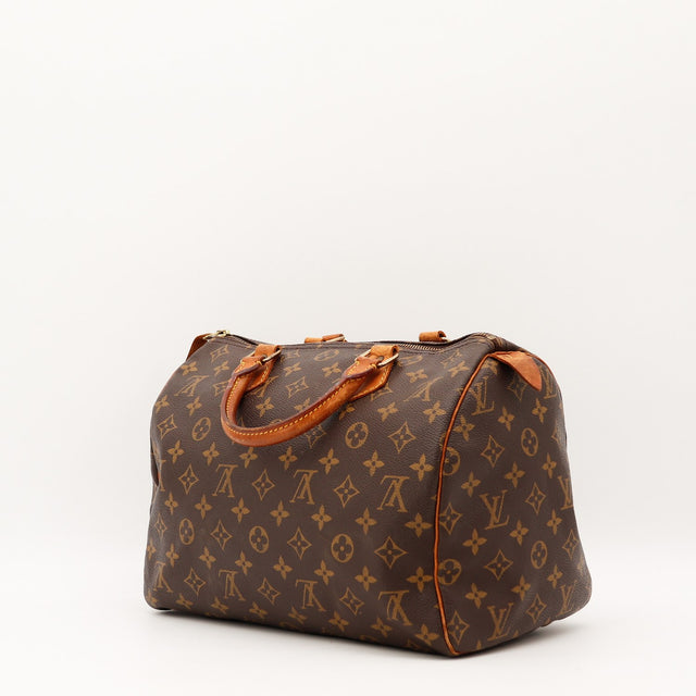 Détail de la doublure Louis Vuitton Speedy 30 Toile Monogramme occasion authentique — AMANA Vintage