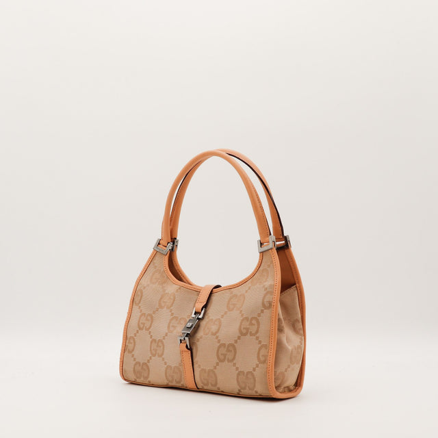Sac Gucci Jackie vue trois quarts cuir cognac occasion authentique — AMANA Vintage