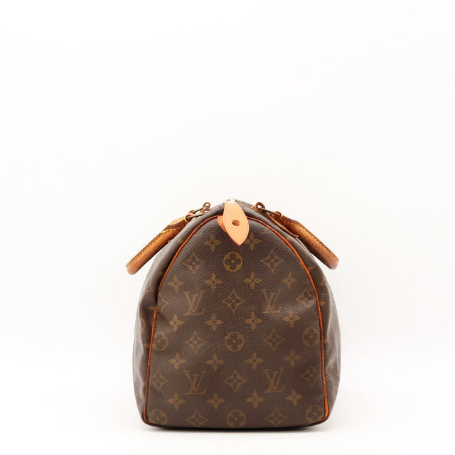 Détail des anses Louis Vuitton Speedy 35 cuir vachette occasion authentique — AMANA Vintage