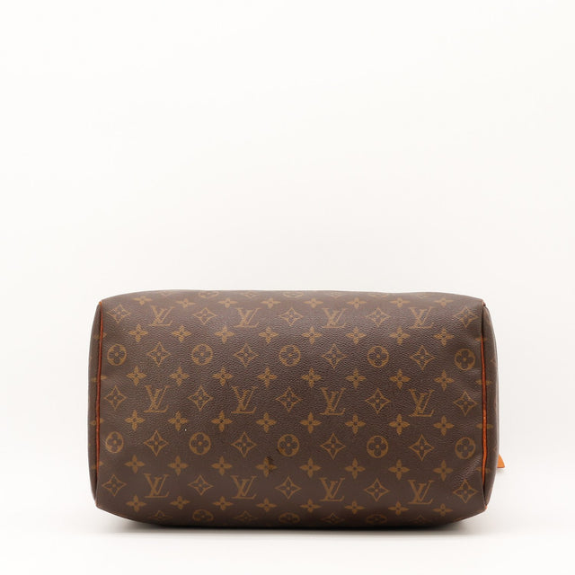Détail du bout de zip Louis Vuitton Speedy 35 Toile Monogramme occasion authentique — AMANA Vintage