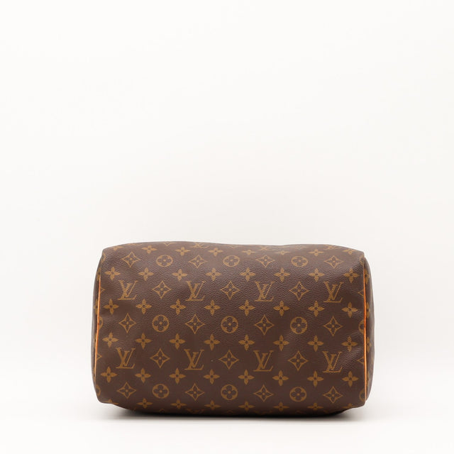 Détail de la fermeture Louis Vuitton Speedy 30 Toile Monogramme occasion authentique — AMANA Vintage