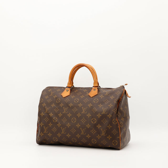 Louis Vuitton Speedy 30 trois quarts toile Monogram patine caramel — AMANA Vintage