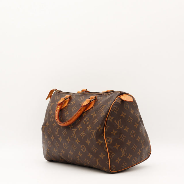 Détail de la doublure Louis Vuitton Speedy 30 Toile Monogramme occasion authentique — AMANA Vintage