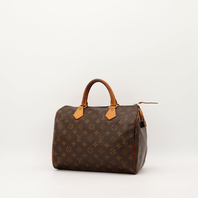 Louis Vuitton Speedy 30 trois quarts toile Monogram anses cuir vachette — AMANA Vintage