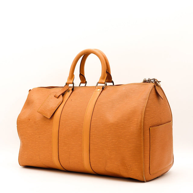 Vue de dos Louis Vuitton Keepall 45 cuir Épi ocre occasion authentique — AMANA Vintage