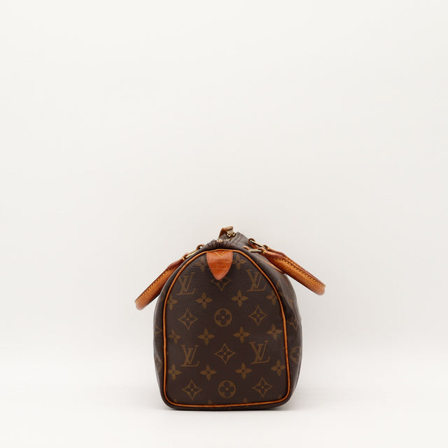 Détail de la fermeture et de l'argenterie dorée Louis Vuitton Speedy 25 occasion authentique — AMANA Vintage