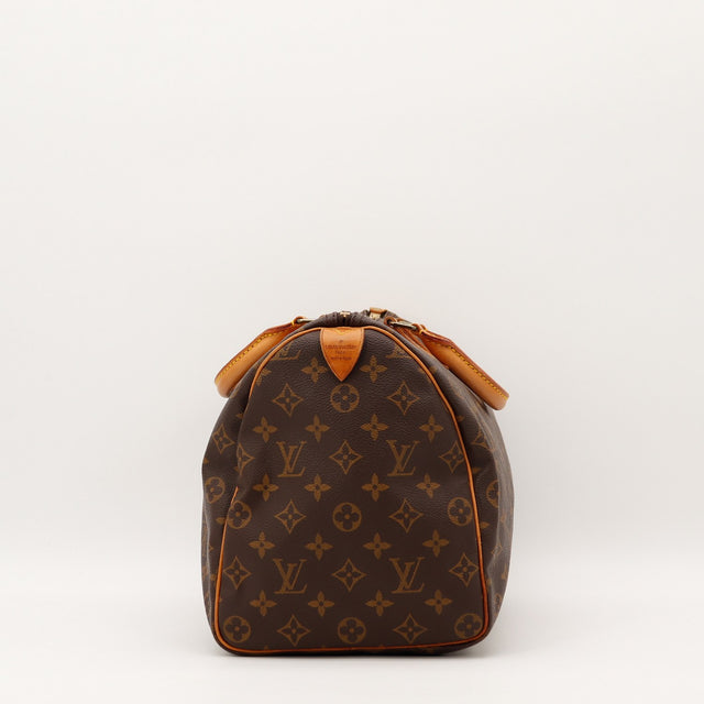 Détail des anses Louis Vuitton Speedy 35 Toile Monogramme occasion authentique — AMANA Vintage