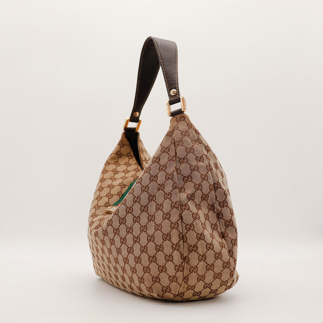 Vue de profil sac Gucci Hobo Web toile monogrammée anse cuir marron foncé occasion — AMANA Vintage
