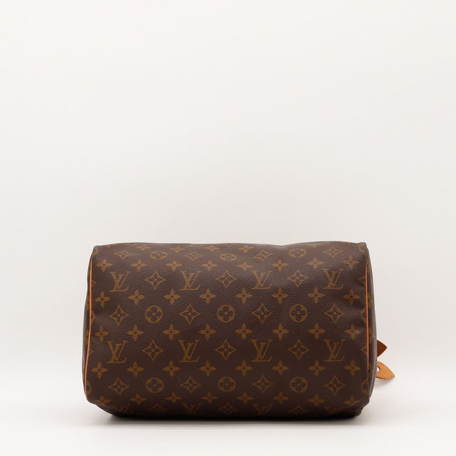 Détail de la fermeture Louis Vuitton Speedy 30 Toile Monogramme occasion authentique — AMANA Vintage