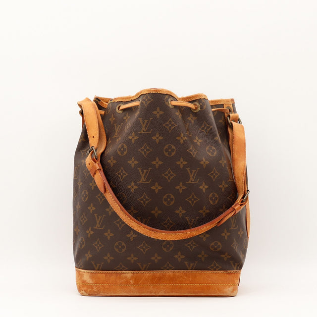 Vue de côté Louis Vuitton Noé Toile Monogramme occasion authentique — AMANA Vintage