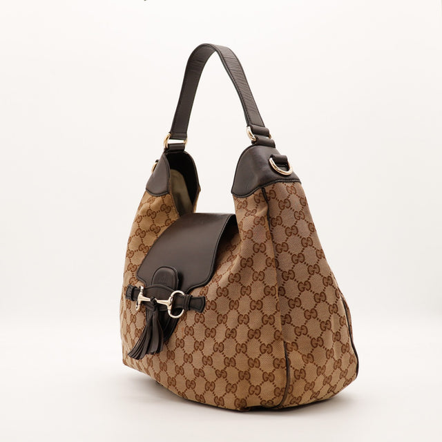 Sac Gucci Hobo Horsebit vue de trois quarts avec anse cuir marron occasion authentique — AMANA Vintage