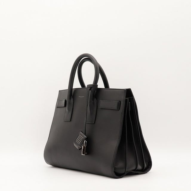 Sac de Jour Small Saint Laurent cuir noir vue trois quarts occasion authentique — AMANA Vintage