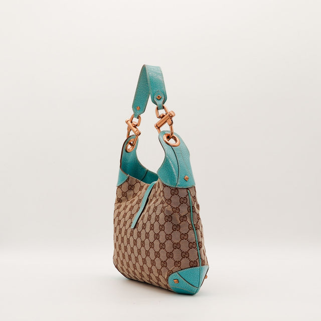 Sac Gucci New Jackie vue de profil anse cuir turquoise occasion authentique — AMANA Vintage