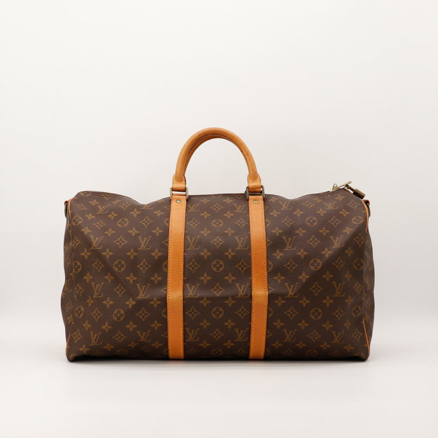 Sac de voyage Louis Vuitton Keepall 50 Bandouliere toile Monogram vue de face occasion authentique — AMANA Vintage