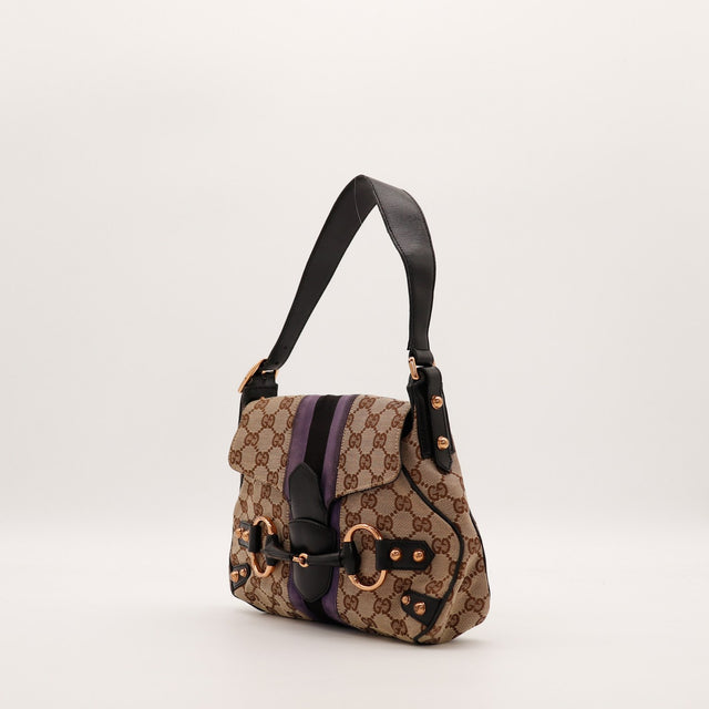 Vue de trois quarts Gucci Hobo Horsebit monogramme bandoulière noire dorée rose — AMANA Vintage