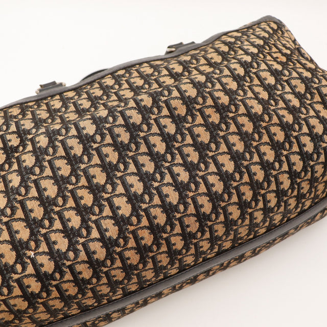 Detail coin superieur Boston Trotter Dior decollement cuir visible — AMANA Vintage