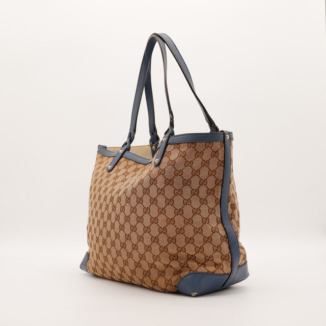 Vue de trois quarts Tote Bag Bottega Veneta toile monogrammée bleu marine — AMANA Vintage