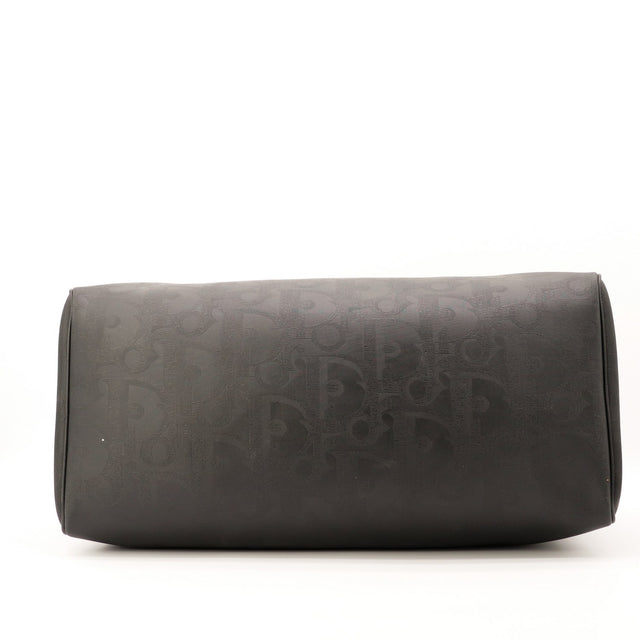Vue du dessous sac de voyage Dior Boston Trotter noir occasion authentique — AMANA Vintage