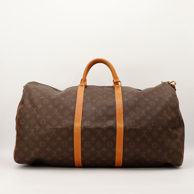 Louis Vuitton Keepall Bandouliere 55 vue trois quarts cote droit occasion authentique — AMANA Vintage