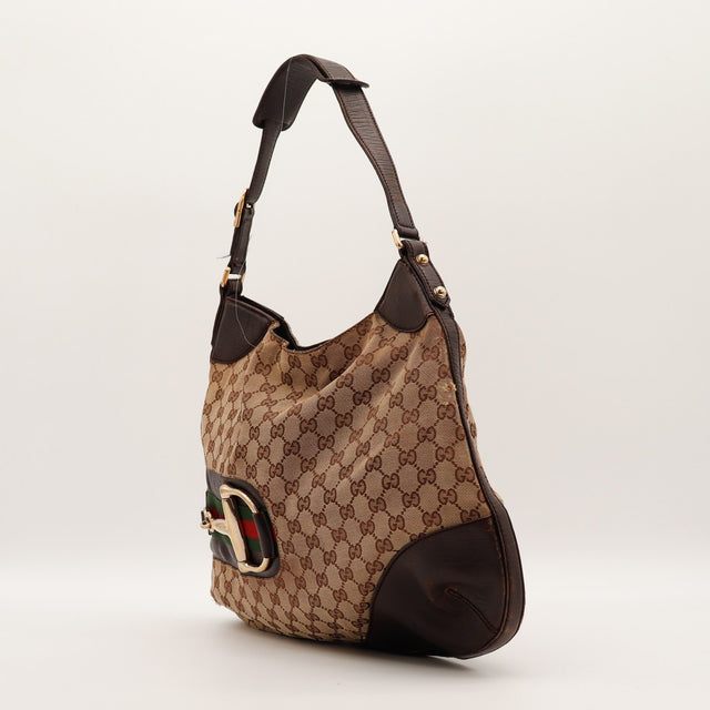 Sac Gucci Hobo Horsebit vue de trois quarts cuir marron occasion authentique — AMANA Vintage