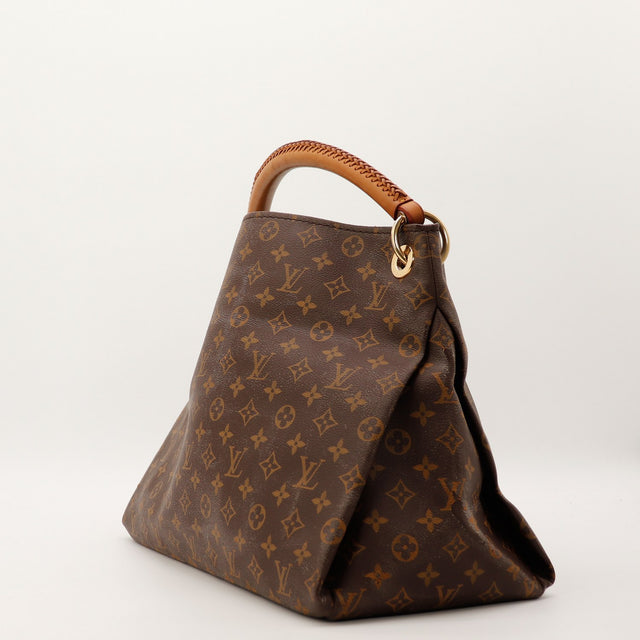 Louis Vuitton Artsy MM vue de profil toile Monogram anse tressee vachette — AMANA Vintage