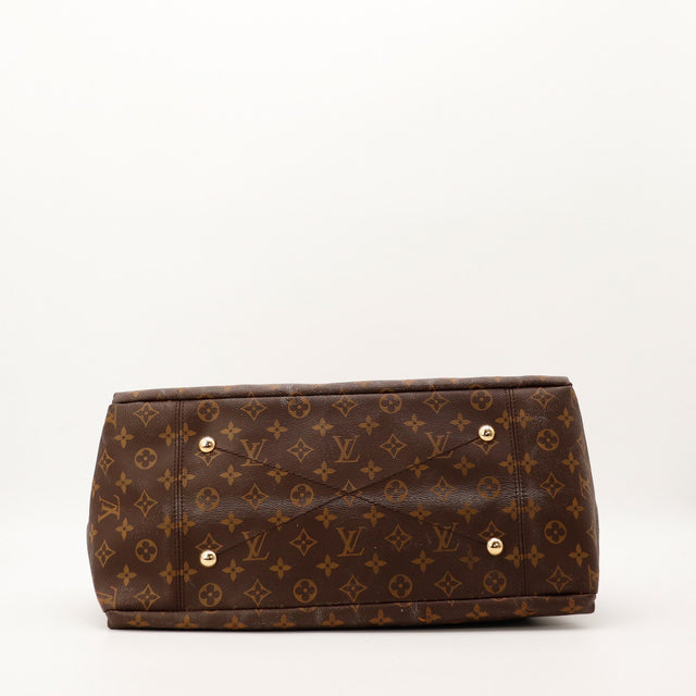 vista de la base Louis Vuitton Artsy MM con patas dorados — AMANA Vintage