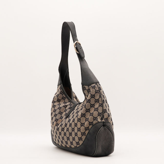 Détail de l'anse en cuir Gucci Jackie occasion authentique — AMANA Vintage