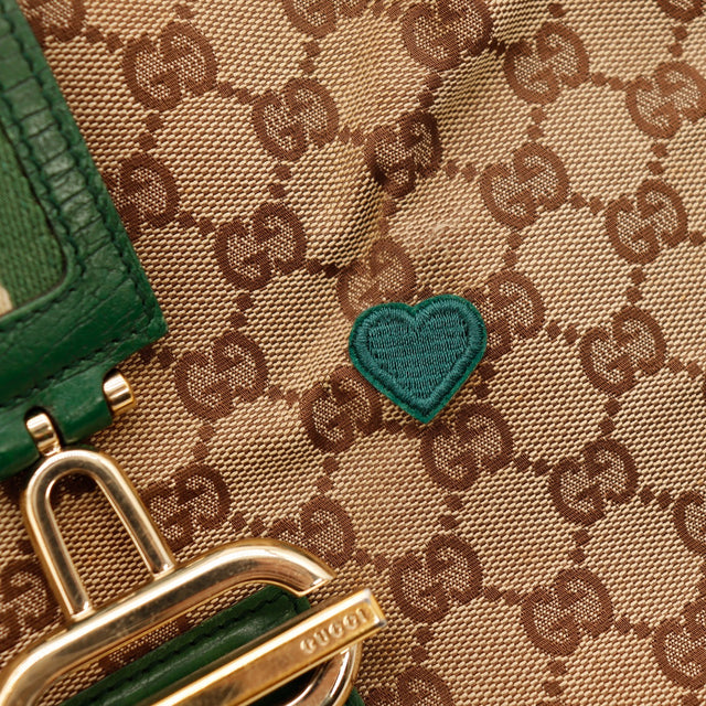 Détail cœur brodé vert sur toile monogrammée Gucci Hobo Web — AMANA Vintage