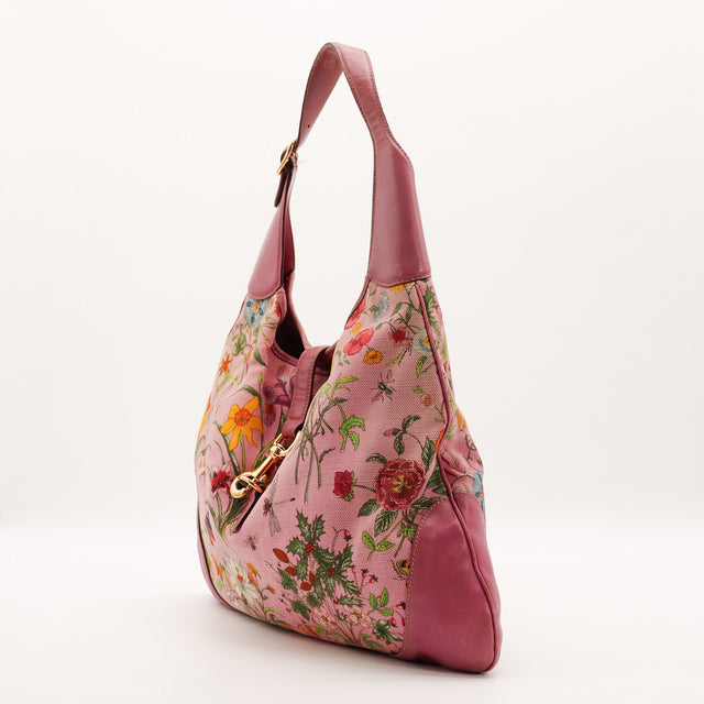 Vue de dos Gucci New Jackie toile Flora rose occasion authentique — AMANA Vintage