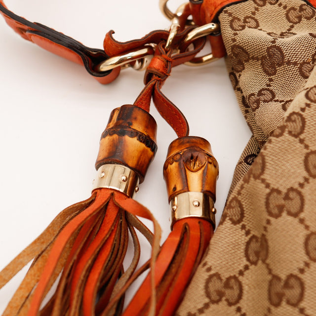 Détail pompons bambou Gucci New Jackie occasion authentique — AMANA Vintage