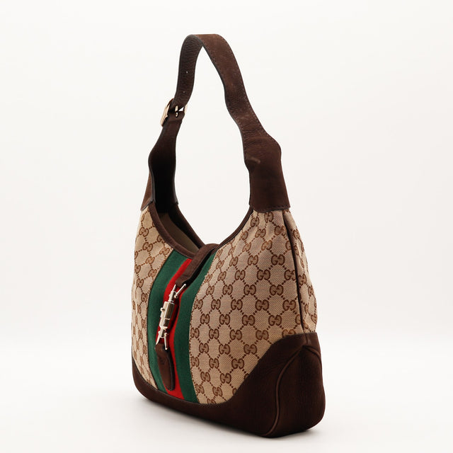Vue de trois-quarts Gucci New Jackie toile monogrammée et bande Web occasion authentique — AMANA Vintage