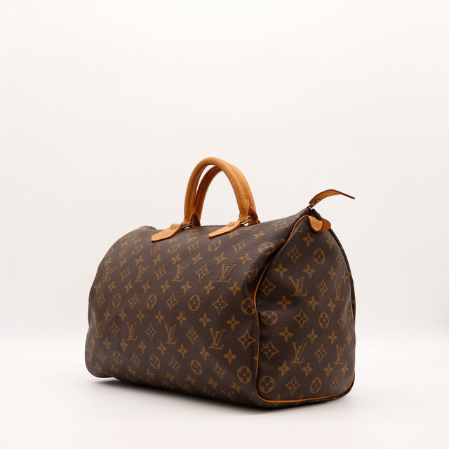 Louis Vuitton Speedy 35 vue de trois quarts toile Monogram patine caramel — AMANA Vintage