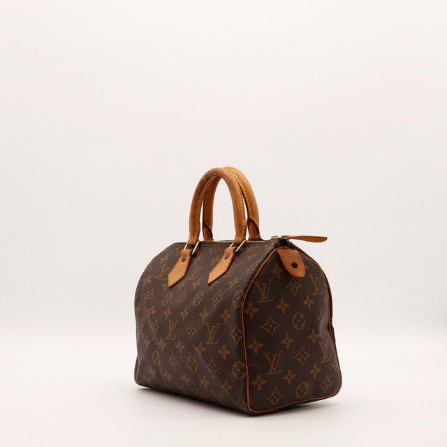Louis Vuitton Speedy 25 vue de trois quarts toile Monogram cuir vachette caramel — AMANA Vintage