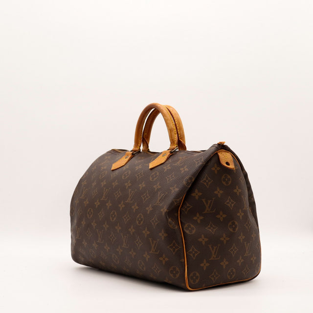 Louis Vuitton Speedy 40 vue trois quarts toile Monogramme patine caramel — AMANA Vintage