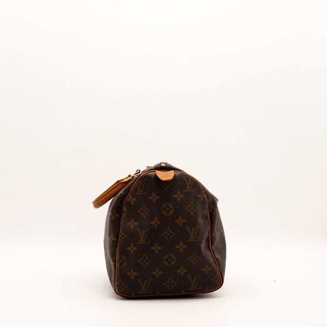 Louis Vuitton Speedy 30 zijaanzicht vachettaleer patine caramel — AMANA Vintage