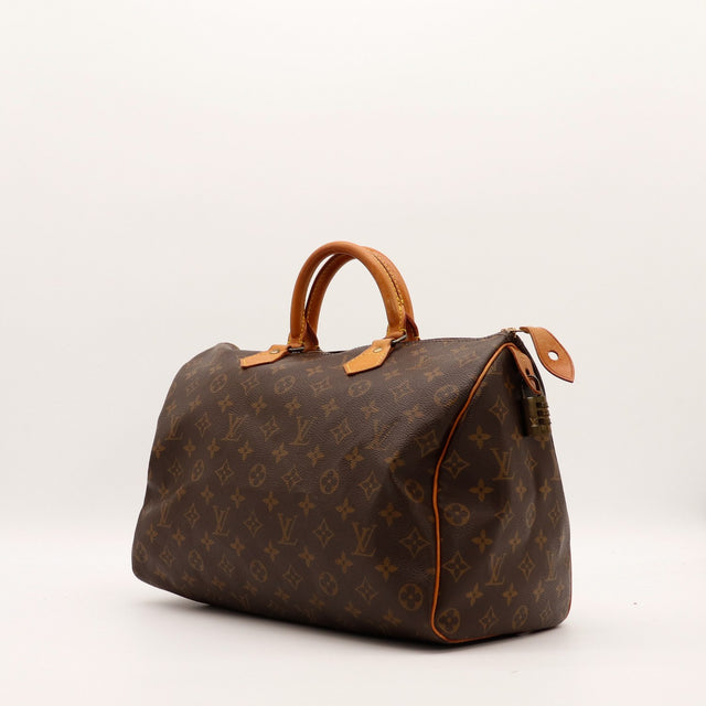 Vue trois quarts Louis Vuitton Speedy 35 toile Monogram patine caramel — AMANA Vintage