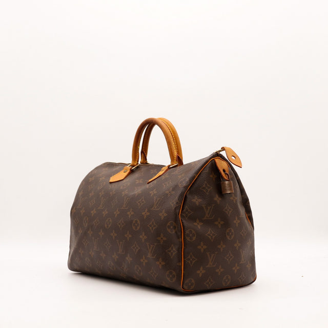 Vue trois quarts Louis Vuitton Speedy 35 toile Monogram patine caramel — AMANA Vintage