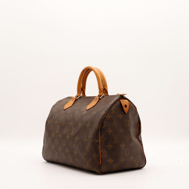 Louis Vuitton Speedy 30 vue de trois quarts toile Monogramme patine caramel — AMANA Vintage