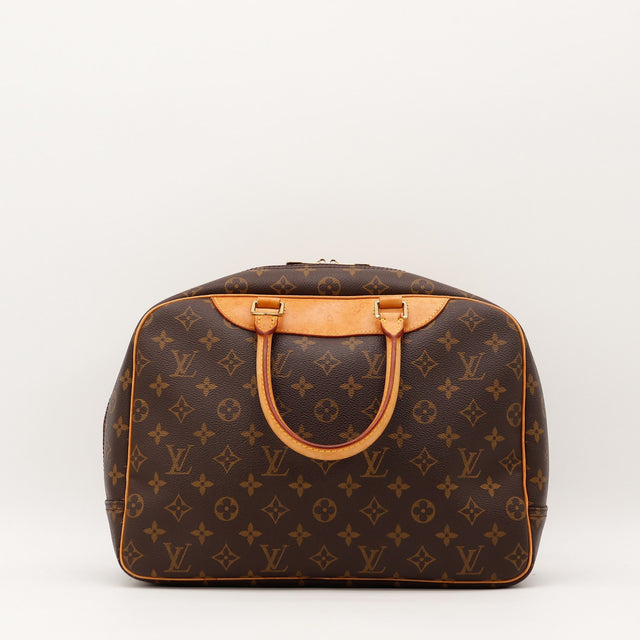 Détail de la patte en cuir supérieure Louis Vuitton Deauville Toile Monogramme occasion authentique — AMANA Vintage
