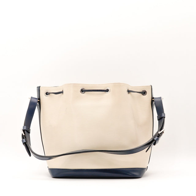 Vue de profil Louis Vuitton Noé cuir Épi beige et bleu occasion authentique — AMANA Vintage