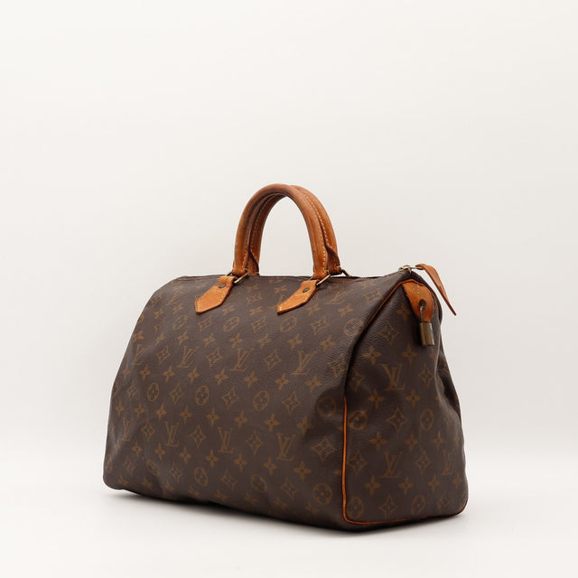 Sac Louis Vuitton Speedy 35 vue trois quarts avec cadenas occasion authentique — AMANA Vintage