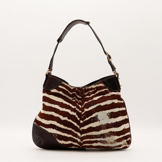 Détail anse cuir Gucci Hobo Horsebit occasion authentique — AMANA Vintage