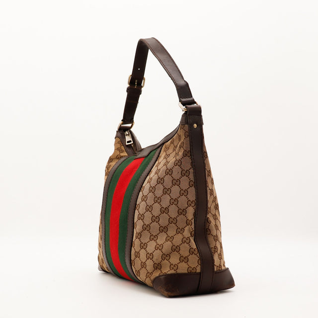 Gucci Hobo Web vue de trois quarts droite toile GG Canvas bande verte rouge occasion — AMANA Vintage