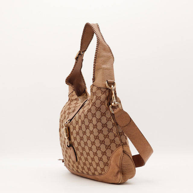Détail fermoir piston doré Gucci New Jackie occasion authentique — AMANA Vintage
