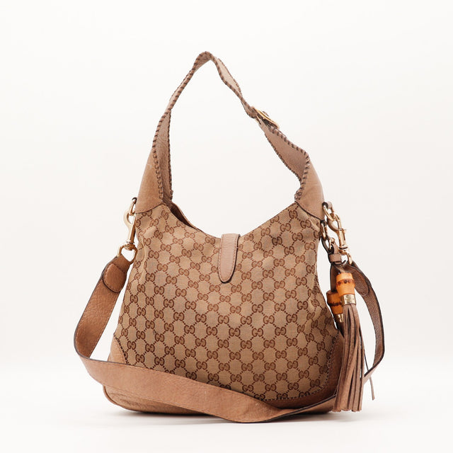 Détail breloque bambou et pompon cuir Gucci New Jackie occasion authentique — AMANA Vintage