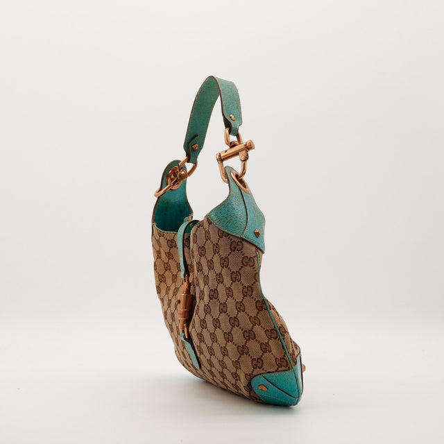 Gucci New Jackie turquoise vue de profil gauche détail anse cuir — AMANA Vintage