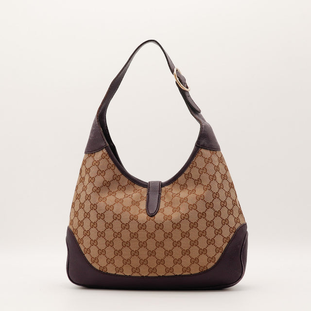 Détail anse cuir prune Gucci Jackie patine occasion authentique — AMANA Vintage