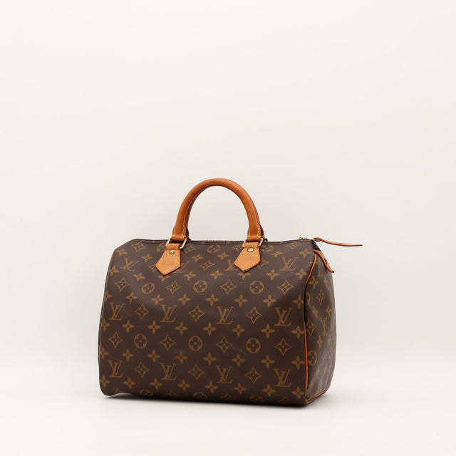 Louis Vuitton Speedy 30 vue trois-quarts angle droit toile monogrammée cuir vachette caramel — AMANA Vintage