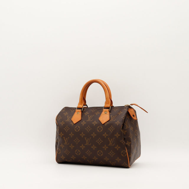 Vue trois-quarts Louis Vuitton Speedy 25 toile Monogram patine caramel — AMANA Vintage